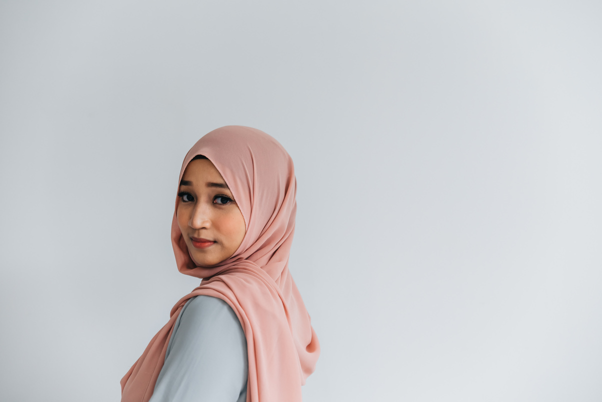 A Woman Looking Over Her Shoulder