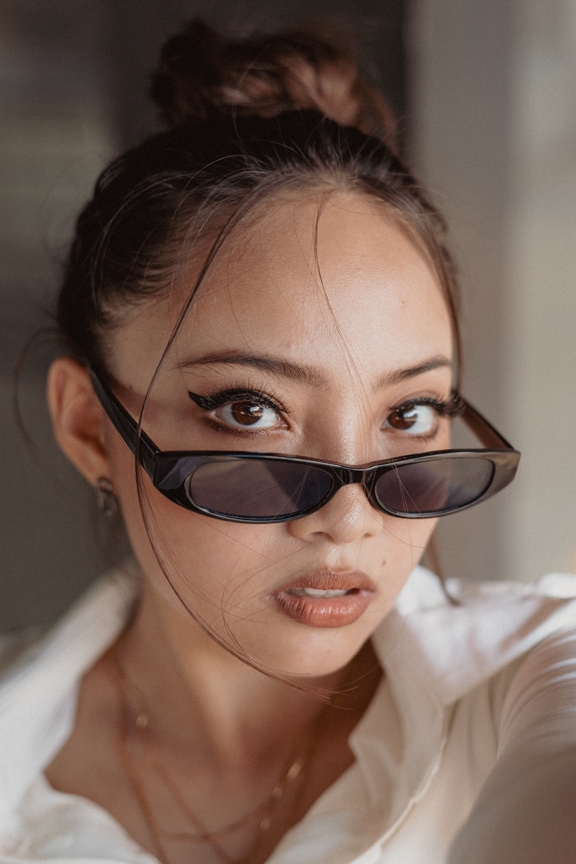 Portrait of a Woman in Sunglasses
